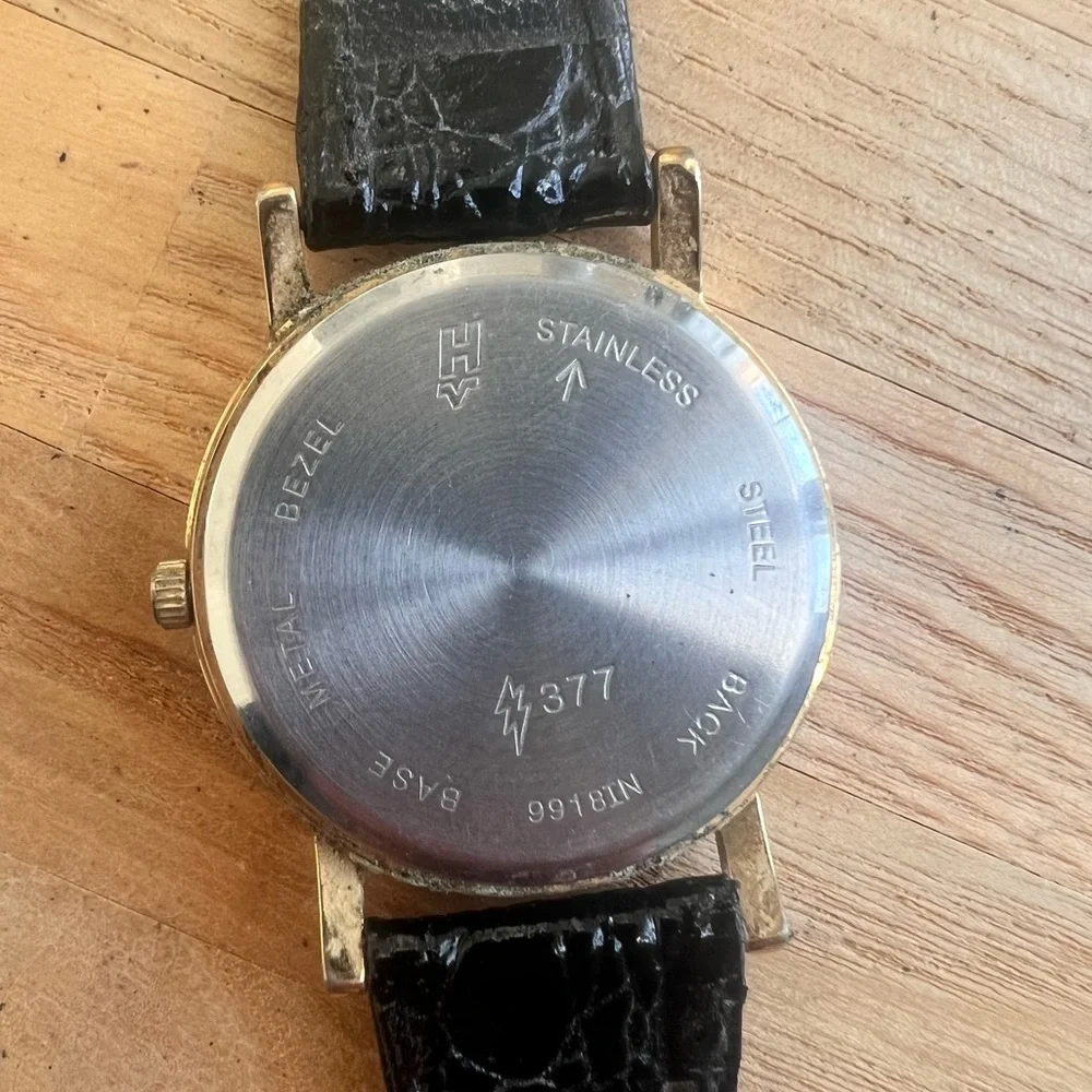Helbros invincible ladies gold tone and black dress watch NEW BATTERY
